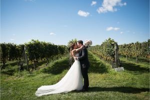 Jessica and Perry Wedding - Ranunculus Majolica Rose Esther Rose Garden Rose Bouquet - Bedell Cellars Cutchogue NY - by Ira Lippke Studio - 0031 (1)