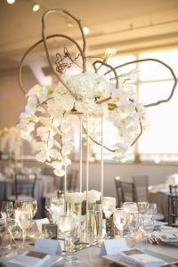 Sophia & Sam Wedding - High Centerpiece Calla Lily Hydrangea Kiwi Vine Phalaenopsis Orchid Garden Spray Rose Wisteria - Tribeca 360 NYC - by Shira Weinberger